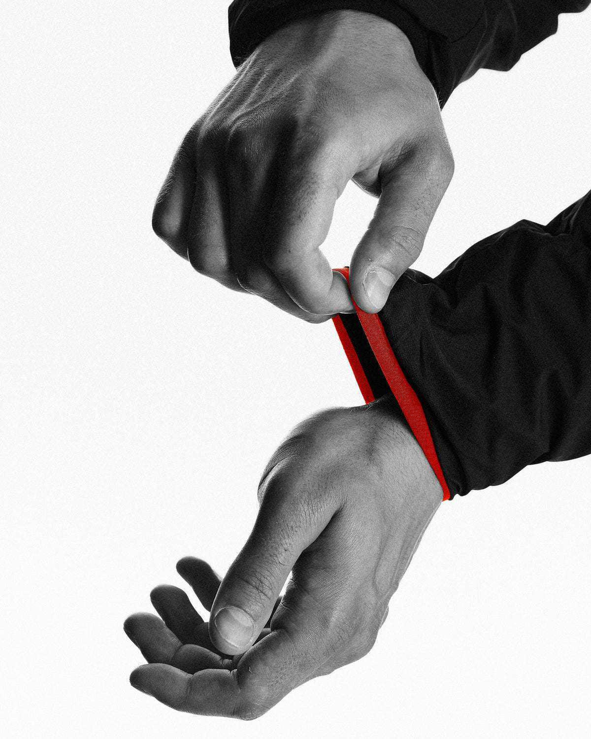 Soft stretch binding at the cuffs and hood opening