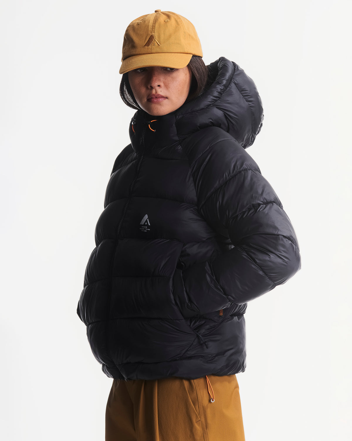 Manteau à capuchon Polar en duvet pour femmes